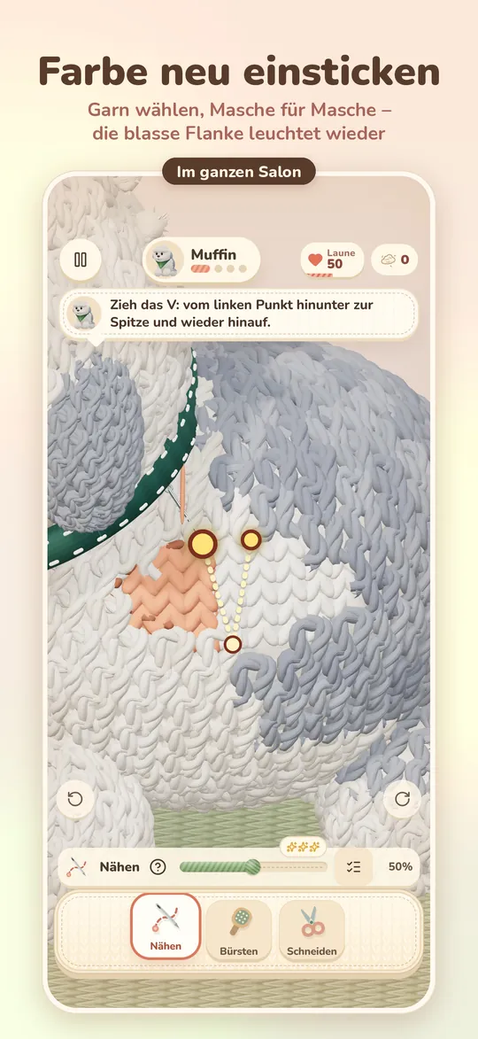 Eine verblasste Stelle wird Masche für Masche mit neuem Garn eingestickt.