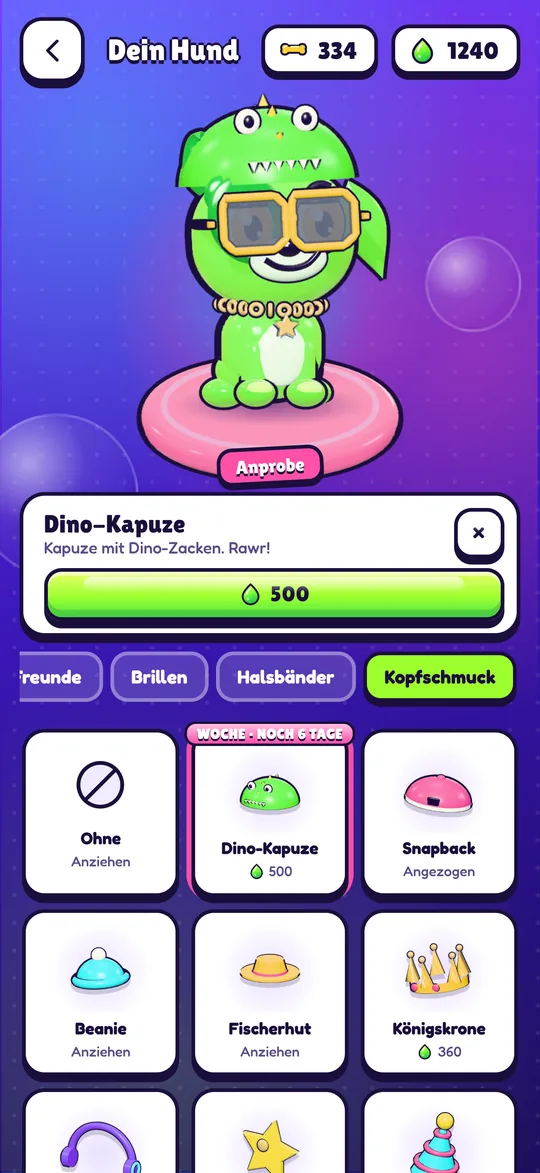 Buddy probiert die Dino-Kapuze an, eines der drei Items dieser Woche.