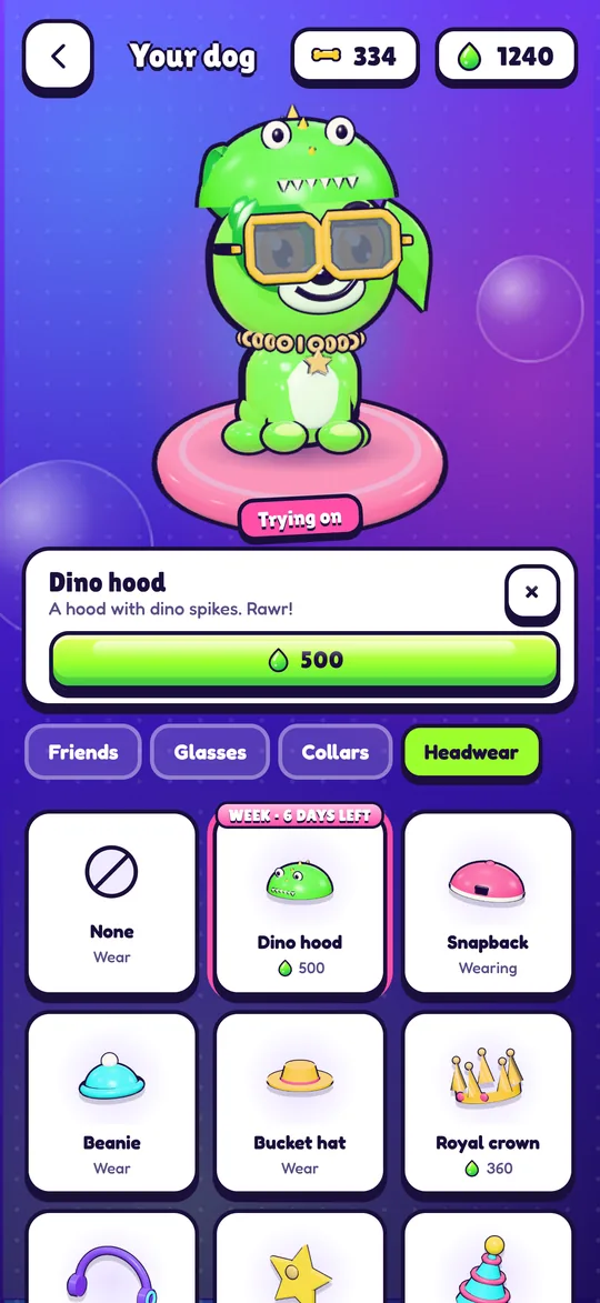 Buddy tries on the dino hood, one of this week's three items.